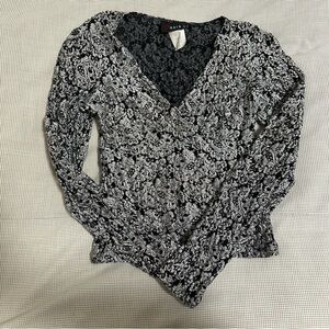 Super cute black/silver floral metallic top! Size S